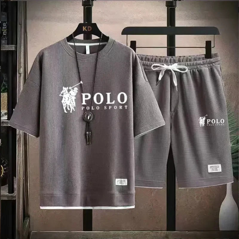 2025 Men's Short-sleeved T-shirt + Sports Shorts Two-piece Summer Fashion Breathable Fitness Casual Jogging Set. Rebel