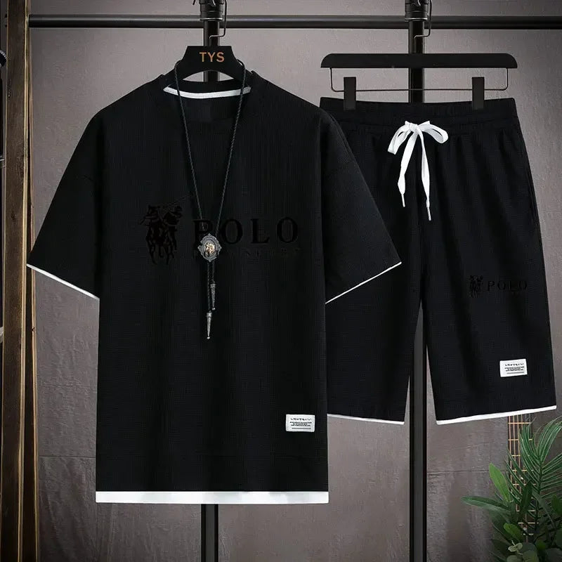 2025 Men's Short-sleeved T-shirt + Sports Shorts Two-piece Summer Fashion Breathable Fitness Casual Jogging Set. Rebel