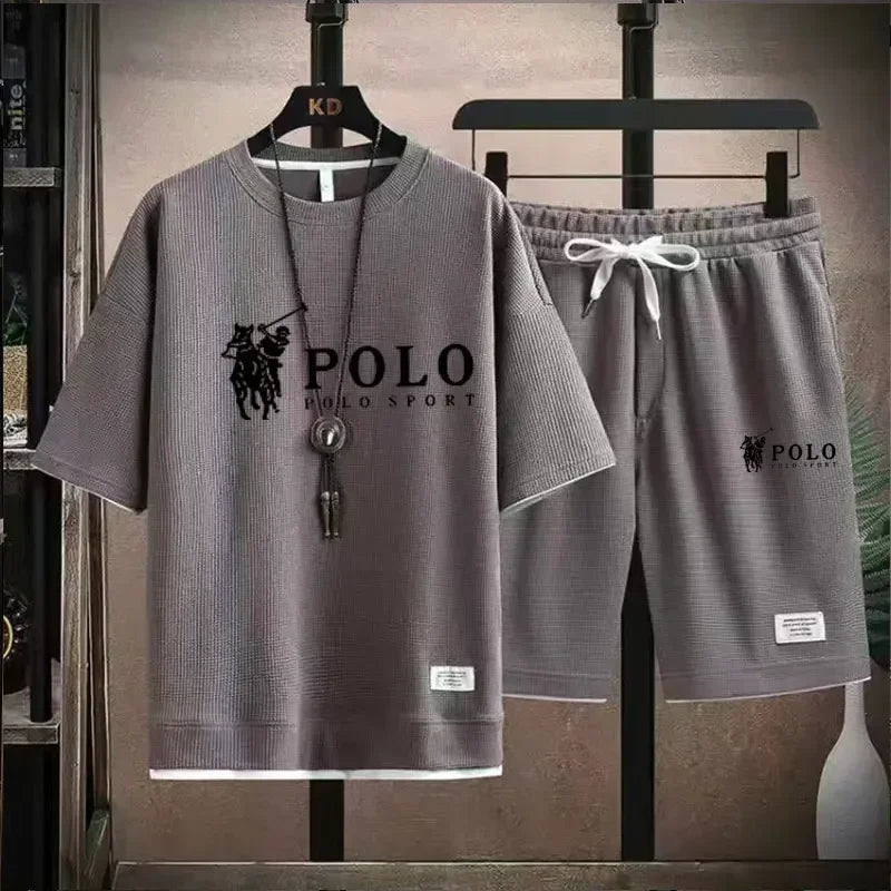 2025 Men's Short-sleeved T-shirt + Sports Shorts Two-piece Summer Fashion Breathable Fitness Casual Jogging Set. Rebel