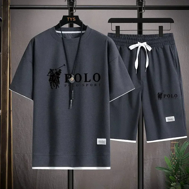 2025 Men's Short-sleeved T-shirt + Sports Shorts Two-piece Summer Fashion Breathable Fitness Casual Jogging Set. Rebel